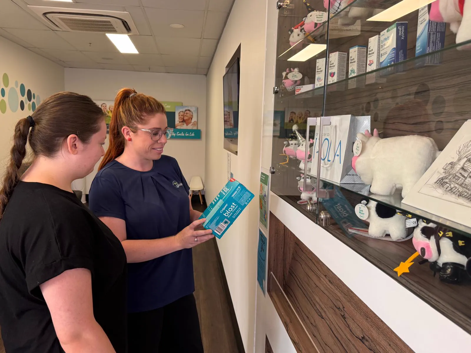 Dental hygienist performing professional clean