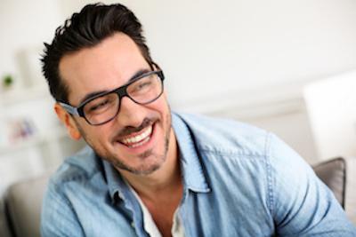 man in glasses smiling | Cosmetic dentist north tamworth