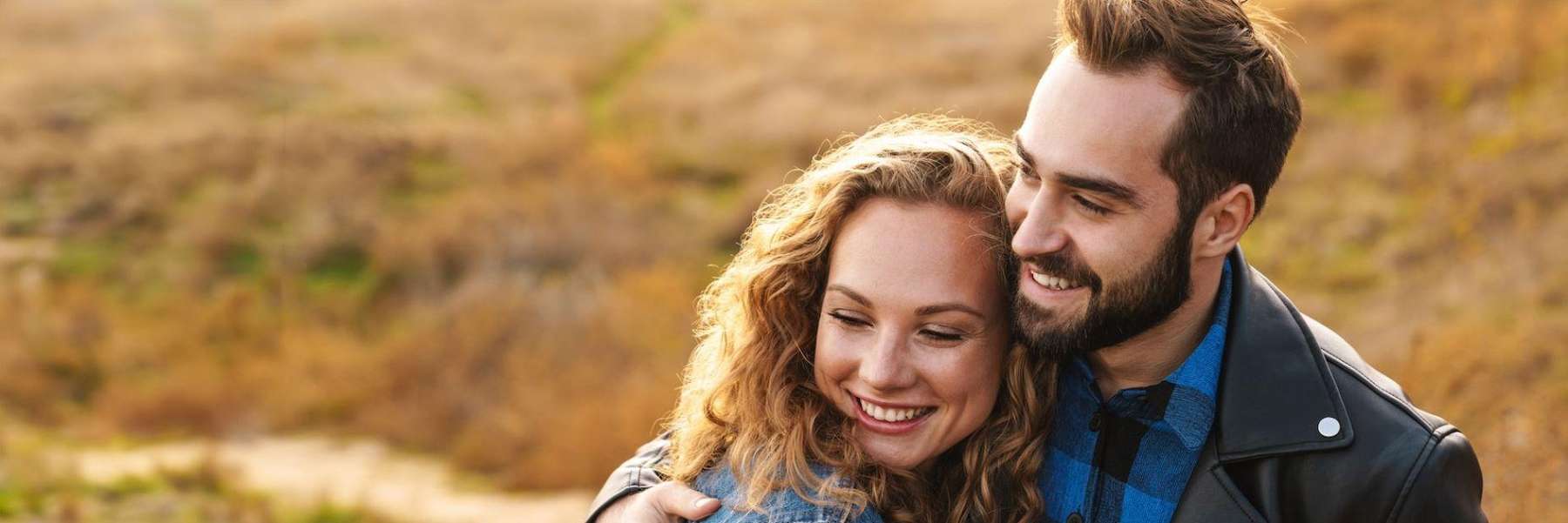 A smiling couple at the park | dentist Tamworth