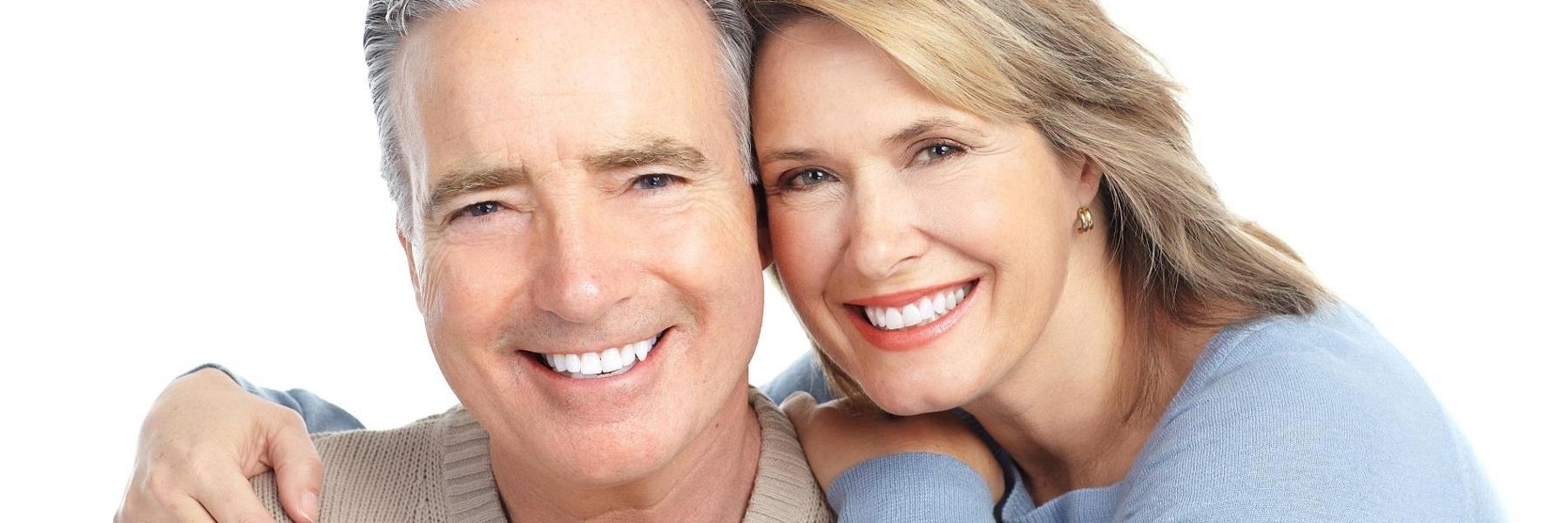 Couple with dental implants in Tamworth