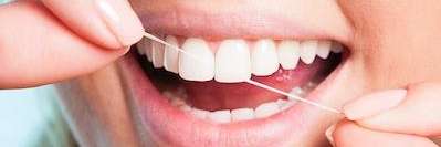 Man flossing | Oasis Smiles Dental Bendemeer