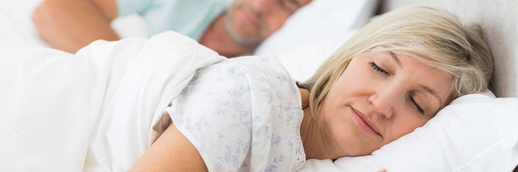 Woman sleeping peacefully with the help of sleep dentistry treatment