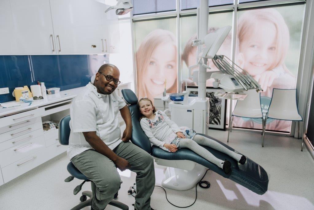 Our Family Friendly Practice Dr. Daniel and a young patient at the North Tamworth dental clinic